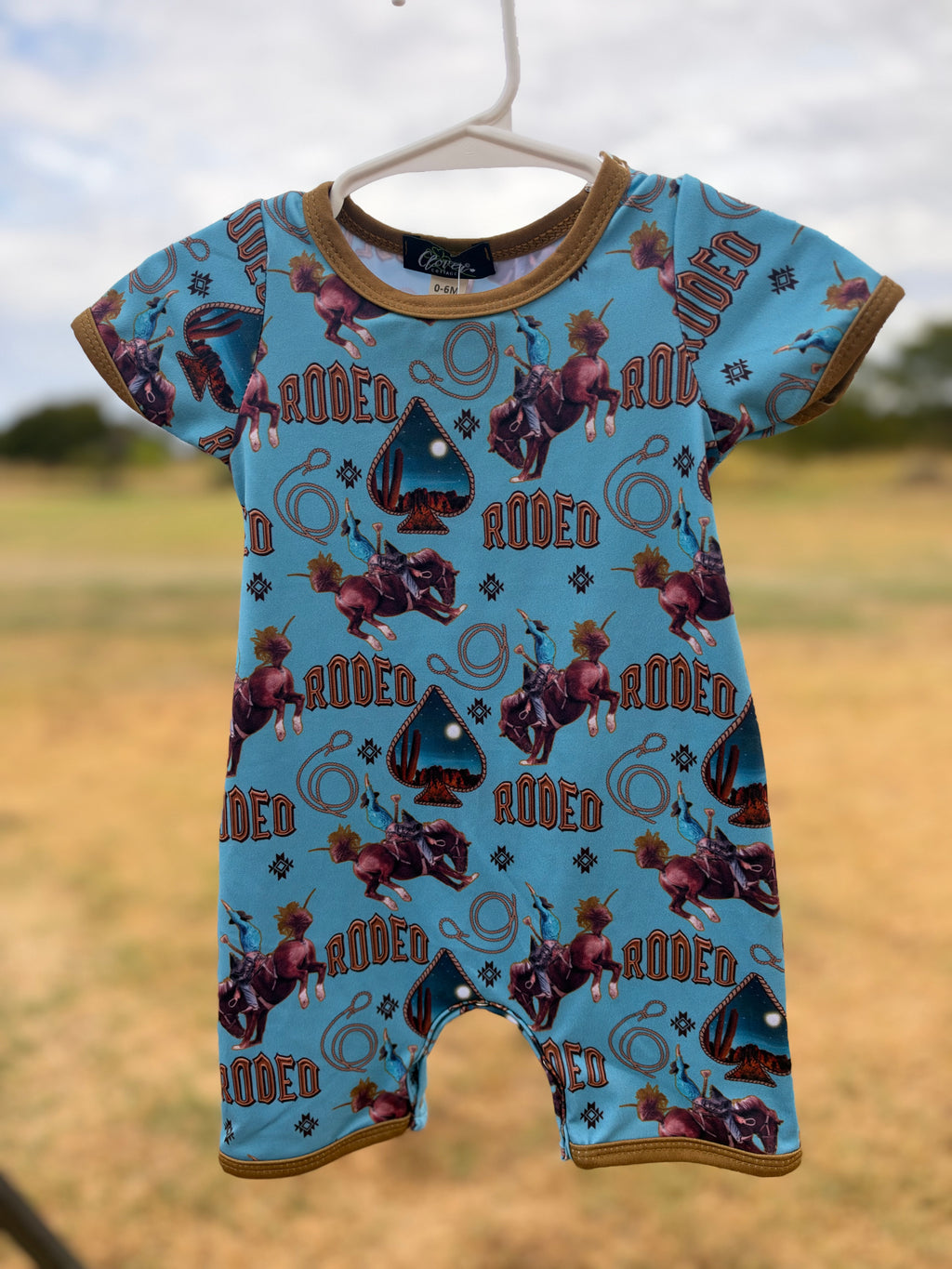 Blue horizon rodeo romper