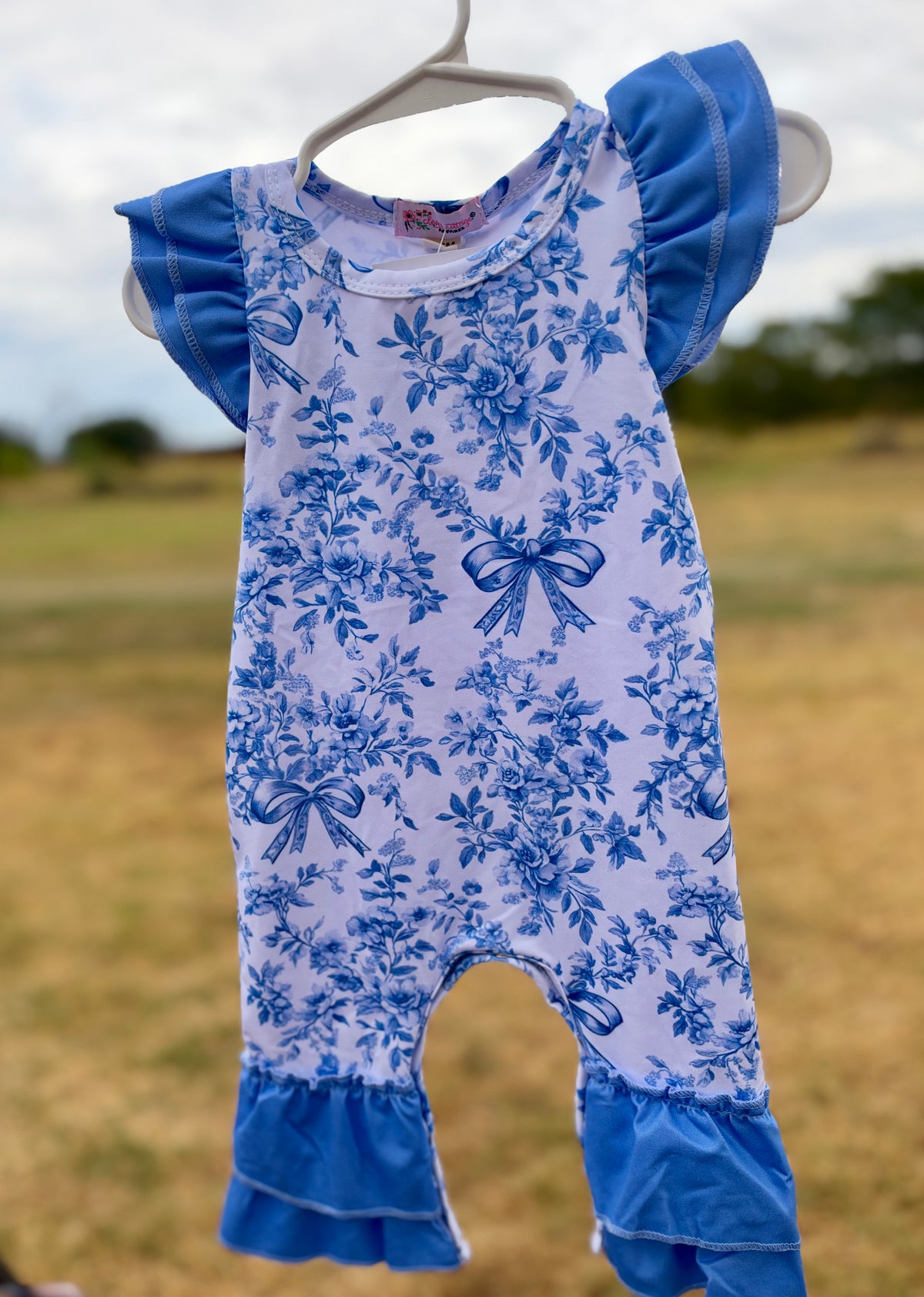 Blue bow baby romper