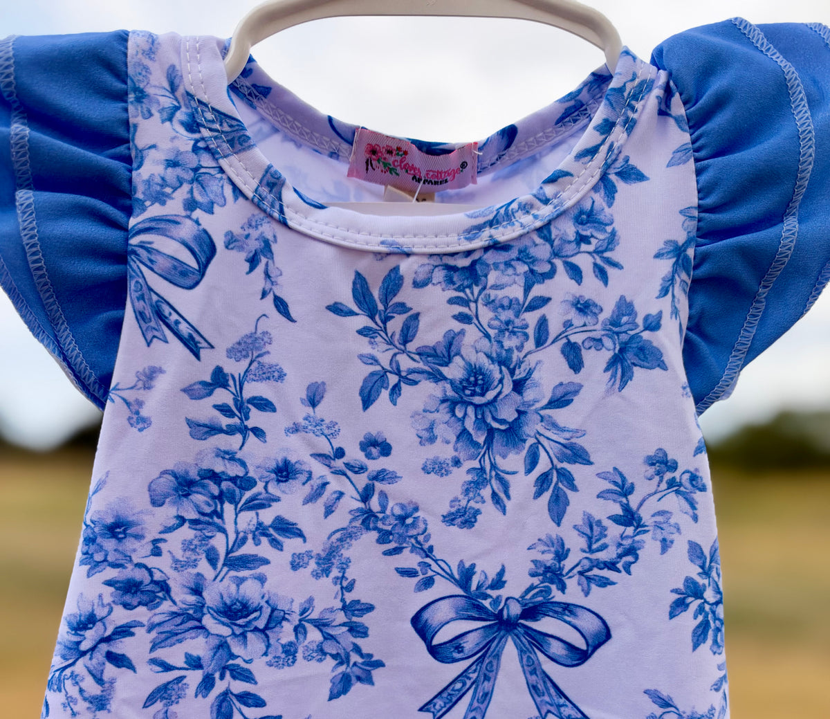 Blue bow baby romper